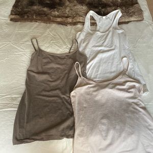 Three tank tops / undershirts, hardly worn, stretchy material, sold together